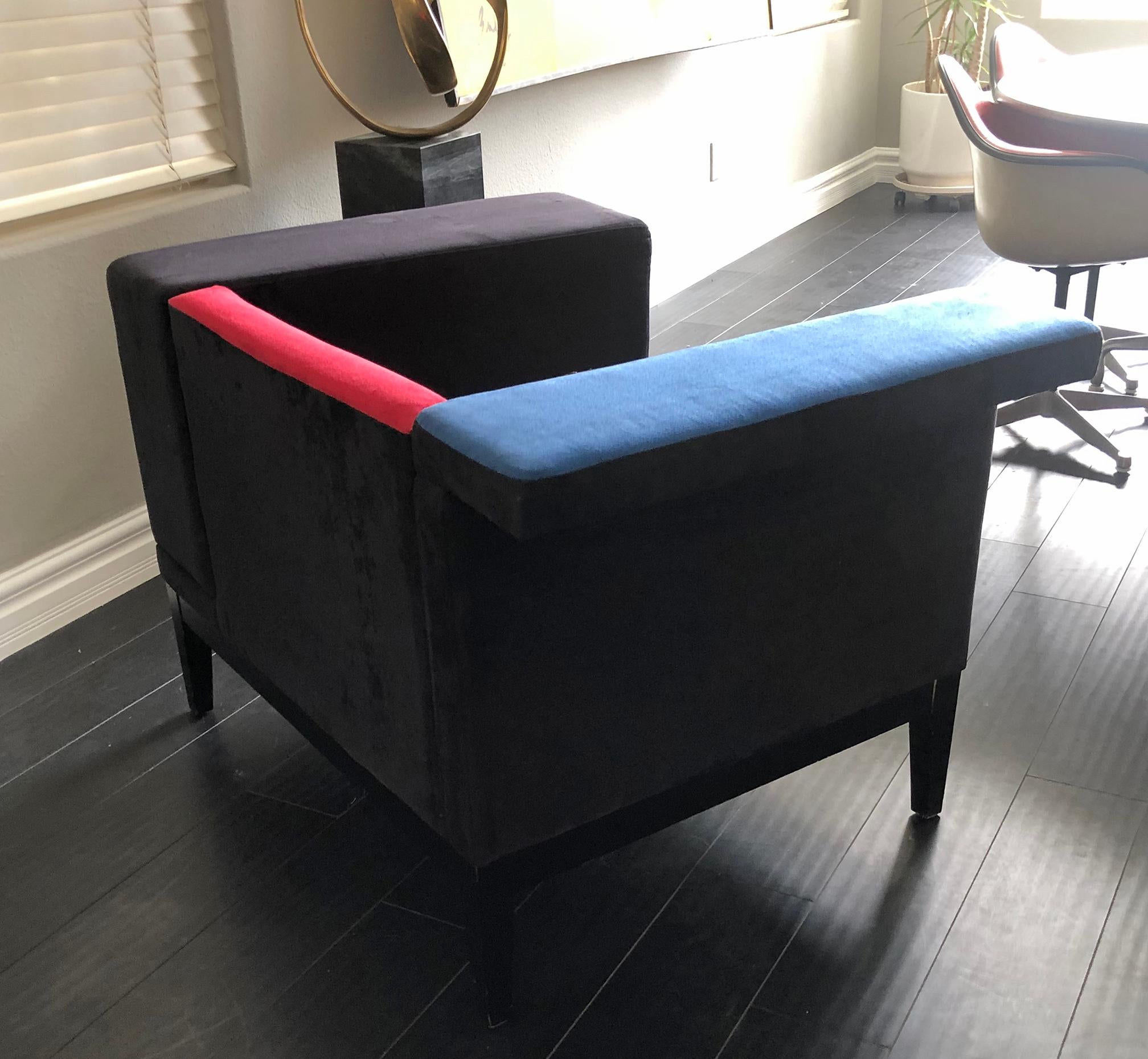A gorgeous chair, clearly an homage to Mondrian and or the De Stijl movement. This chair is upholstered in a microsuede fabric and is sure to bring a needed pop of color to any home or environment.
