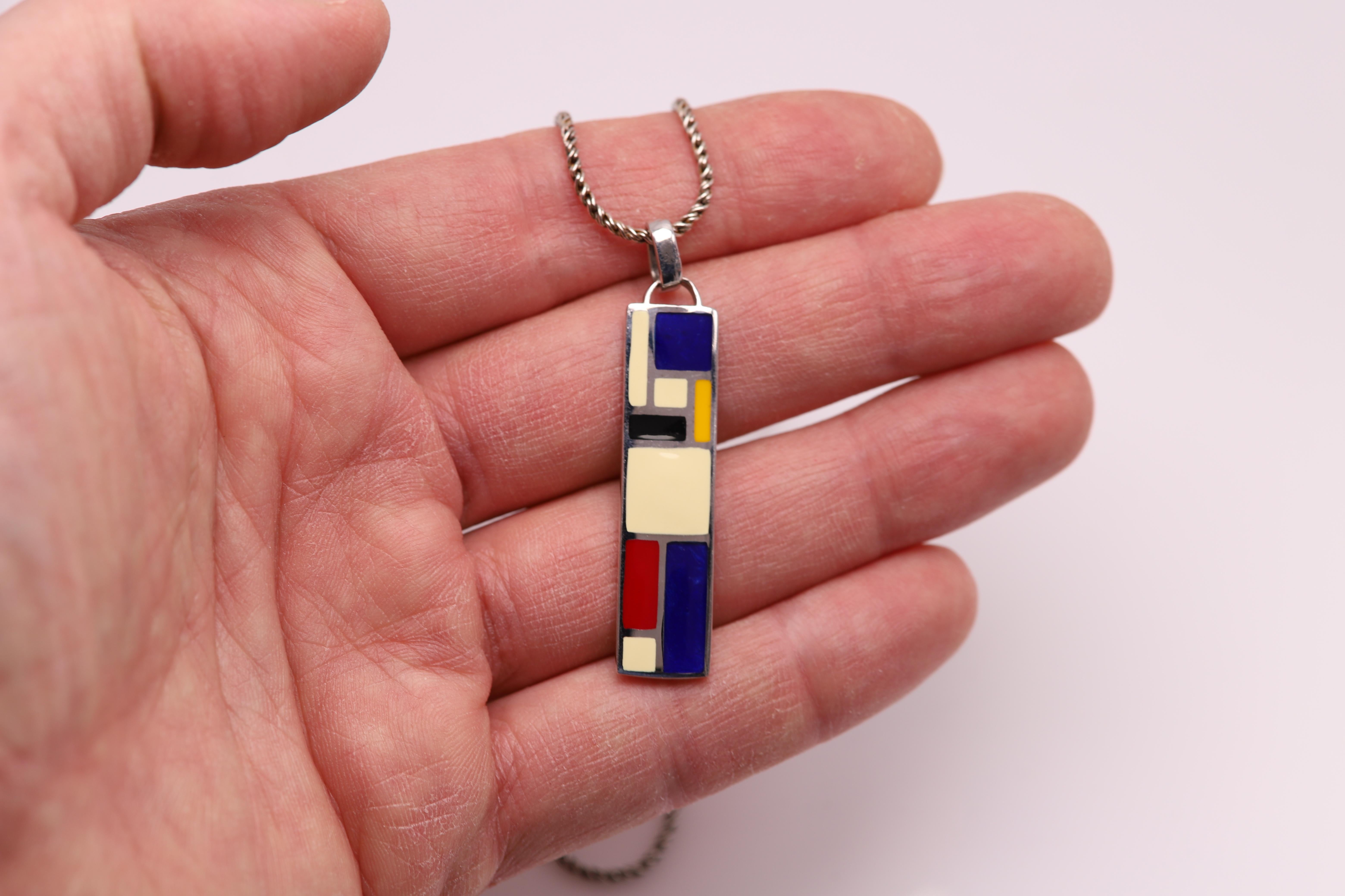 New but Vintage (was made a while ago however never was used)
Enamel Art Pendant Inspired by famous world artist Mondrian.
Sterling Silver 925 hand made in Italy.
Approx dimension 42 x 10 MM   (1.75' inch Long) .
Slightly imperfections may exist due