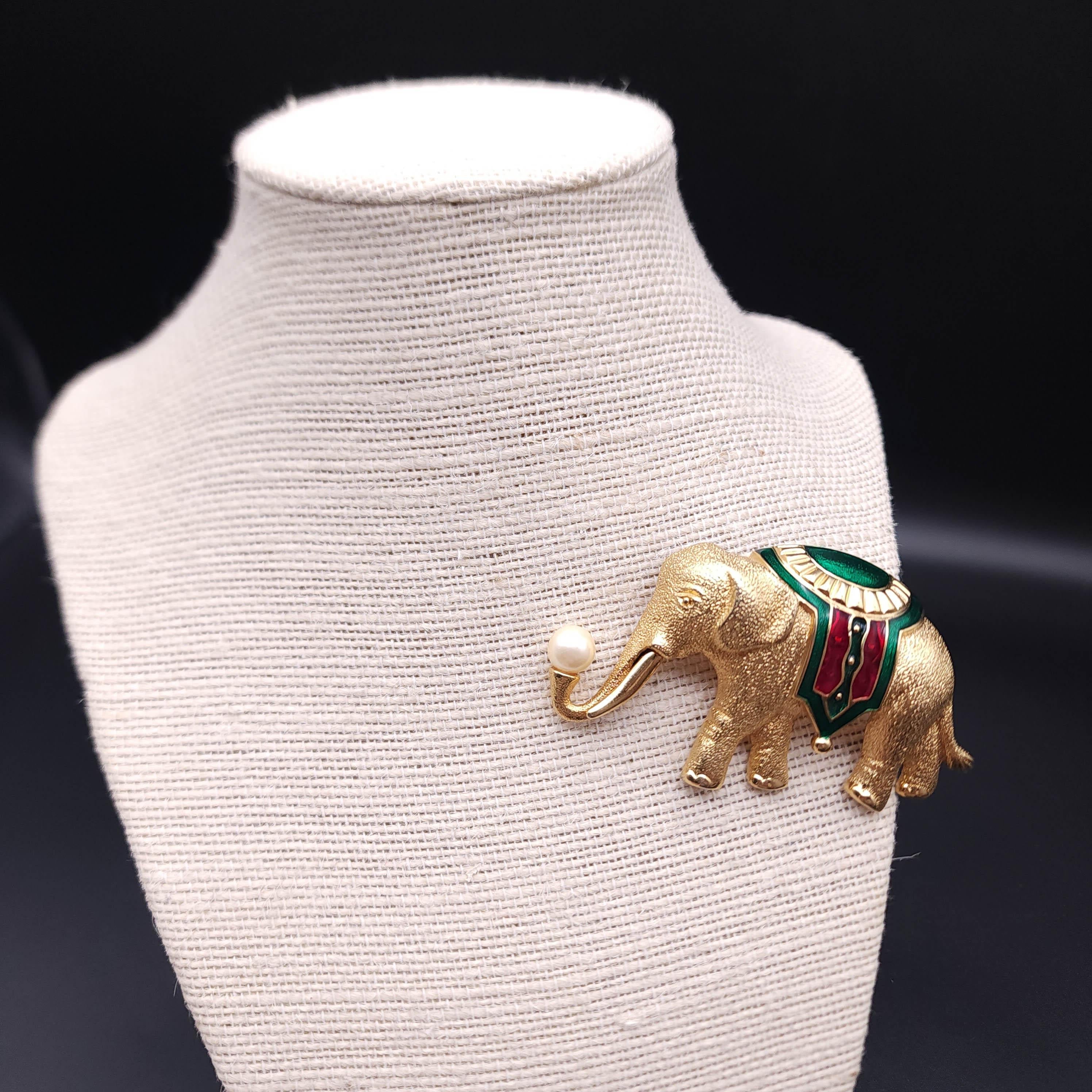 3 x 1.5 inches

Embrace the timeless charm of vintage jewelry with this exquisite Monet elephant pin. Crafted with a lustrous gold-filled metal setting, this piece captures the majestic beauty of an elephant in mid-stride. A symbol of wisdom and