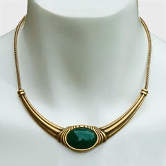 Monet Gold Tone and Grey Enamel Necklace with Dark Green Glass Stone