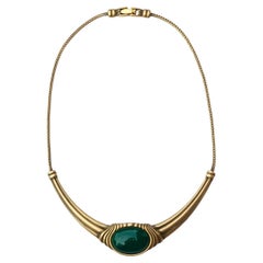 Collana Monet in oro e smalto grigio con pietra di vetro verde scuro