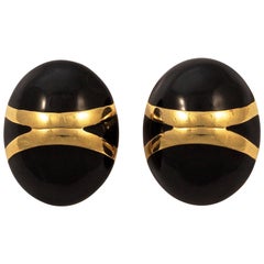 Monet Oval Gold Tone and Black Enamel Clip On Earrings circa 1980s