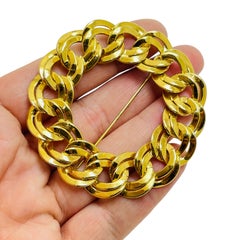 Monet signé chaîne en or ronde énorme broche de créateur de défilé