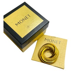 MONET signed gold tone designer brooch w box