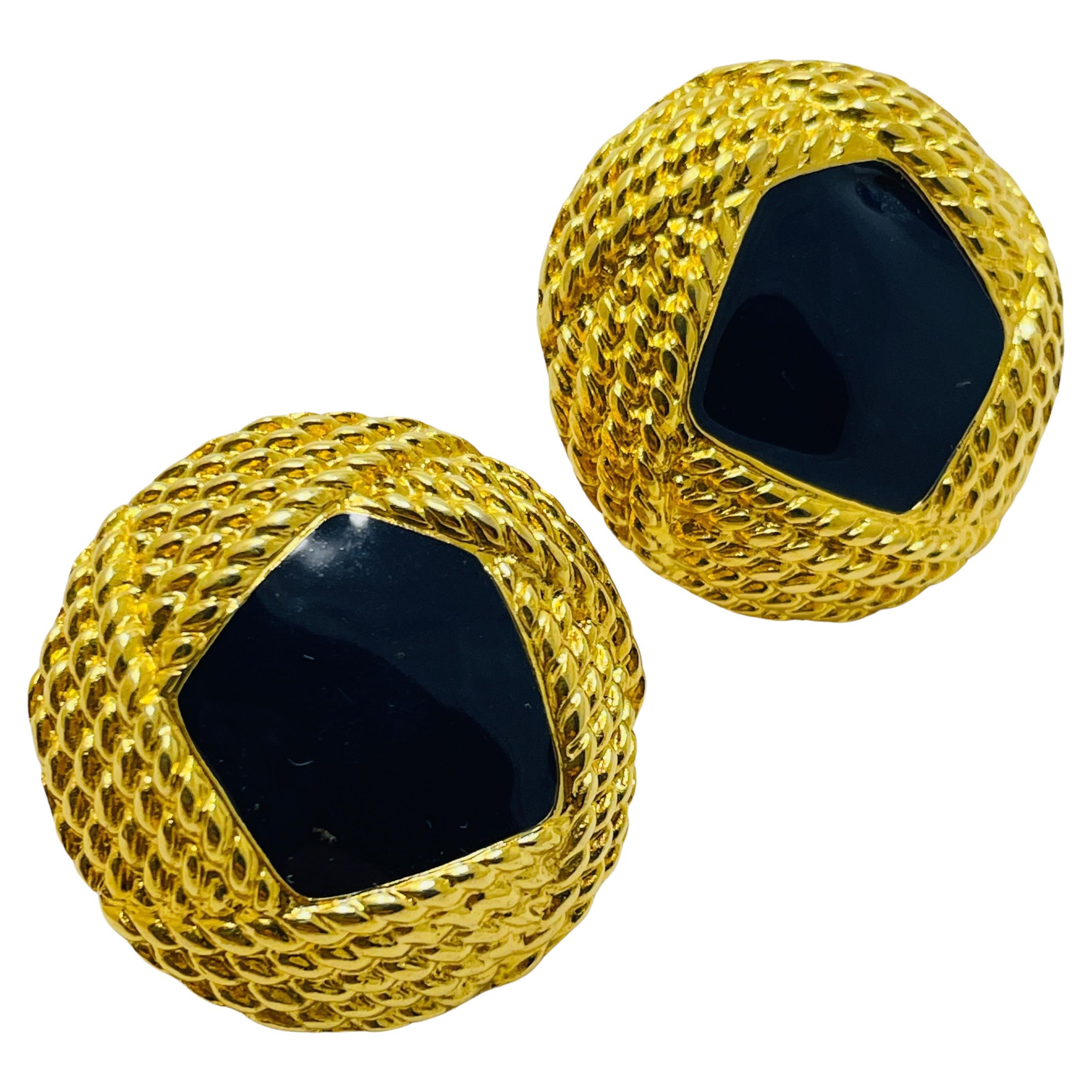 MONET signed gold tone enamel designer clip on earrings For Sale