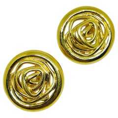 MONET signed gold tone swirl designer clip on earrings