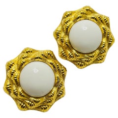 MONET signed gold tone white lucite designer clip on earrings