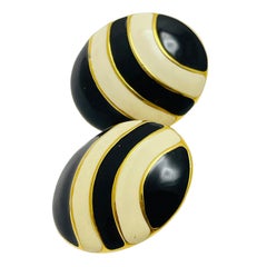 MONET signed vintage gold black white enamel designer clip on earrings
