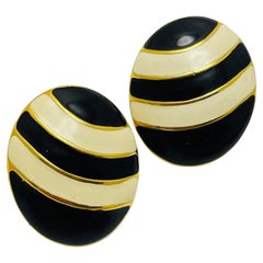 MONET signed vintage gold black white enamel designer clip on earrings