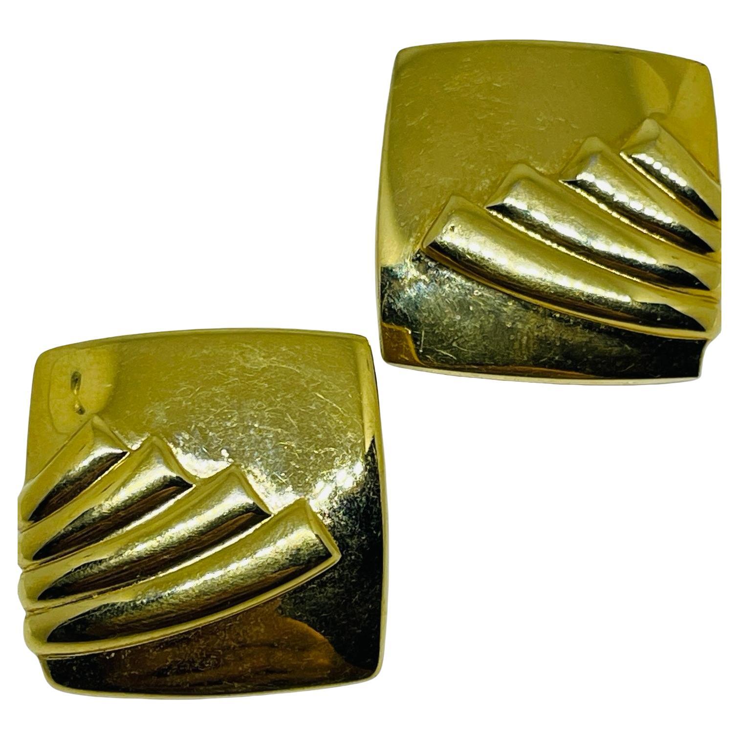 MONET signed vintage gold tone designer clip on earrings For Sale