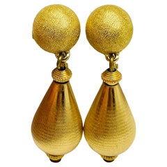 MONET signed vintage gold tone designer dangle clip on earrings