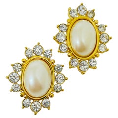 MONET signed vintage gold tone faux pearl rhinestone designer clip on earrings