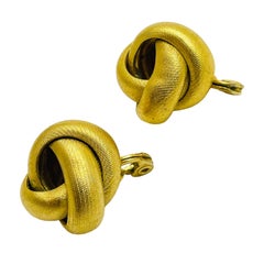 MONET signed vintage gold tone knot designer clip on earrings
