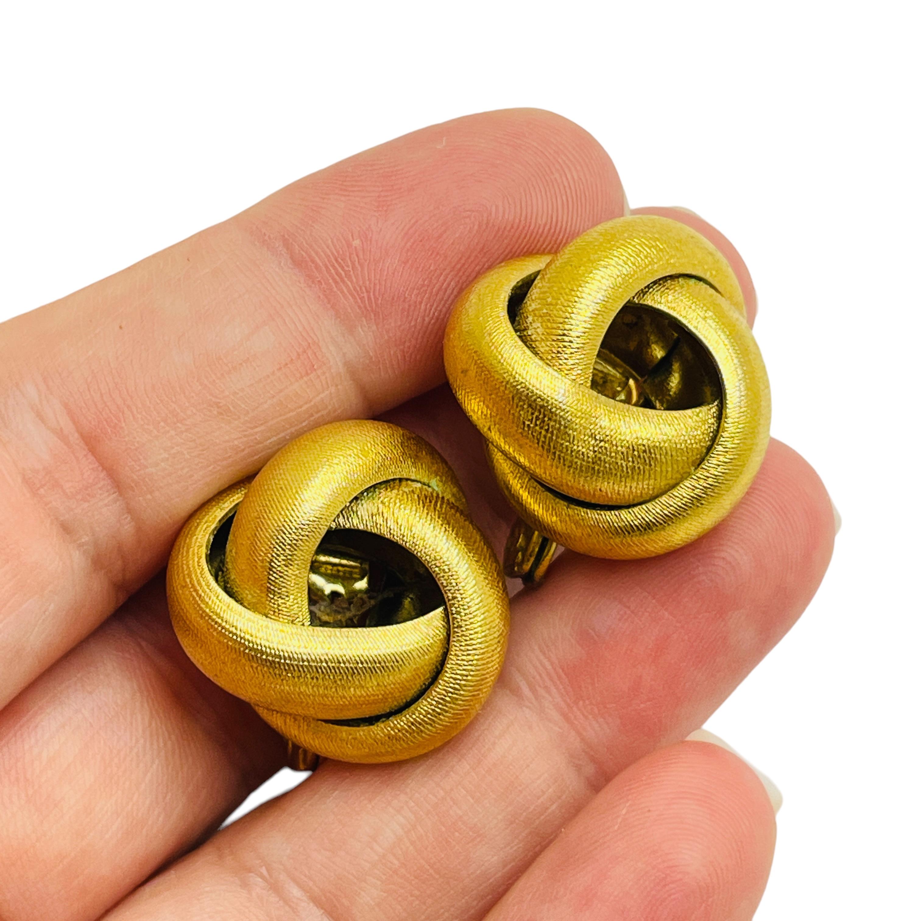 Women's MONET signed vintage gold tone knot designer clip on earrings For Sale
