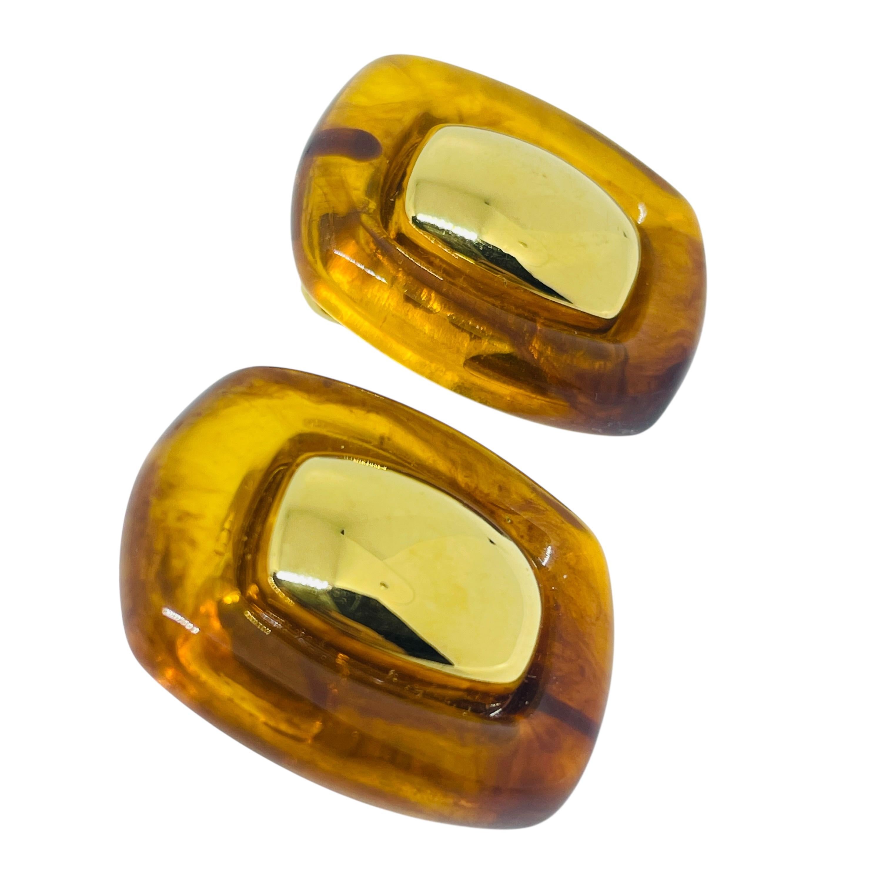 Women's or Men's MONET signed vintage gold tone lucite amber designer 80's clip on earrings For Sale