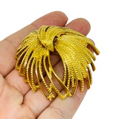 Spilla firmata Monet d'epoca in oro massiccio