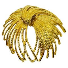 Spilla firmata Monet d'epoca in oro massiccio