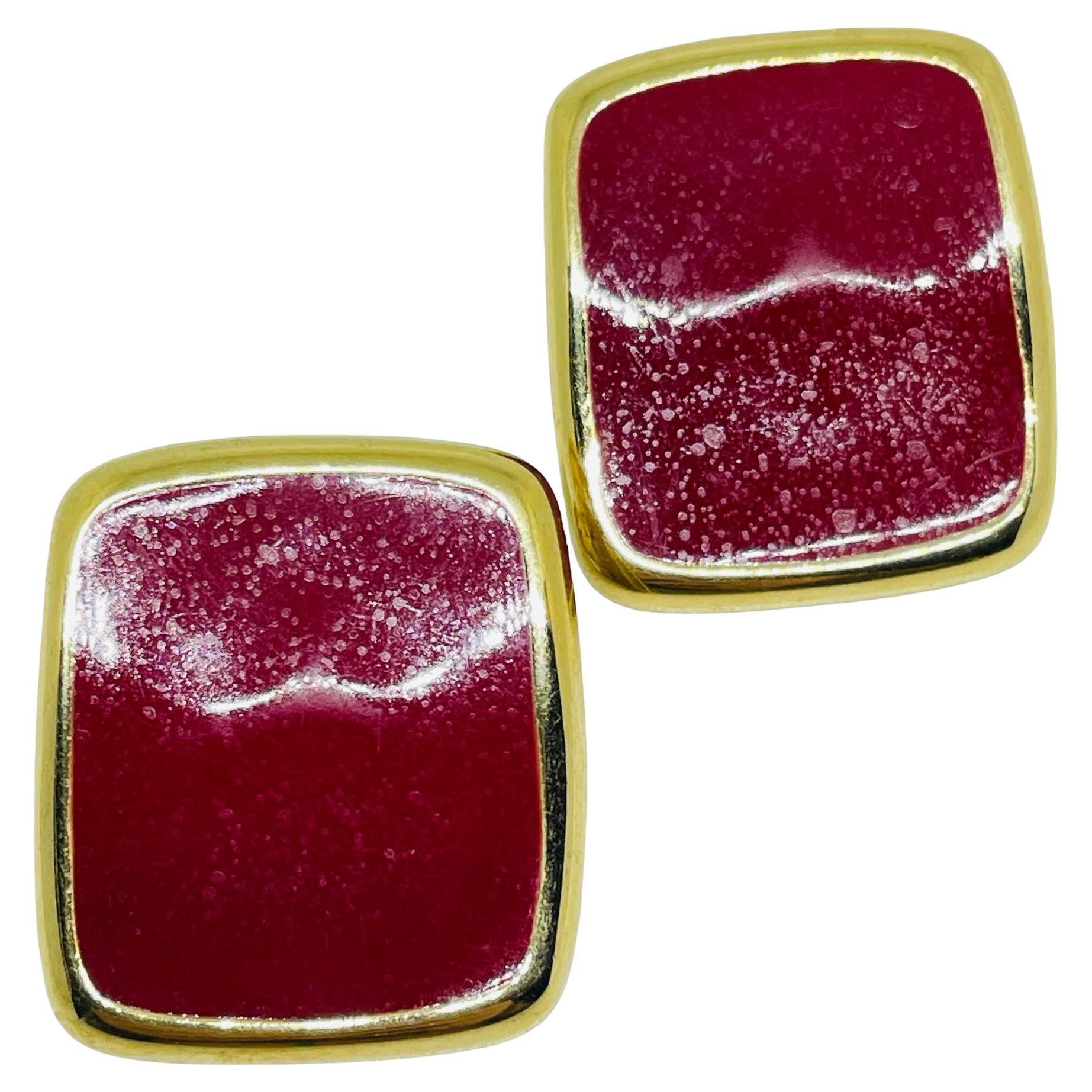 MONET signed vintage gold tone red enamel designer clip on earrings For Sale