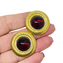 MONET signed vintage gold tone red glass designer clip on earrings