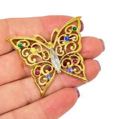MONET signed vintage gold tone rhinestone butterfly designer brooch