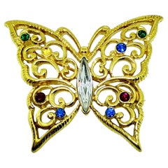 MONET signed vintage gold tone rhinestone butterfly designer brooch