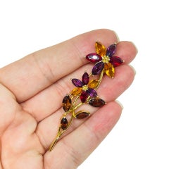 MONET signed vintage gold tone rhinestone flower designer brooch