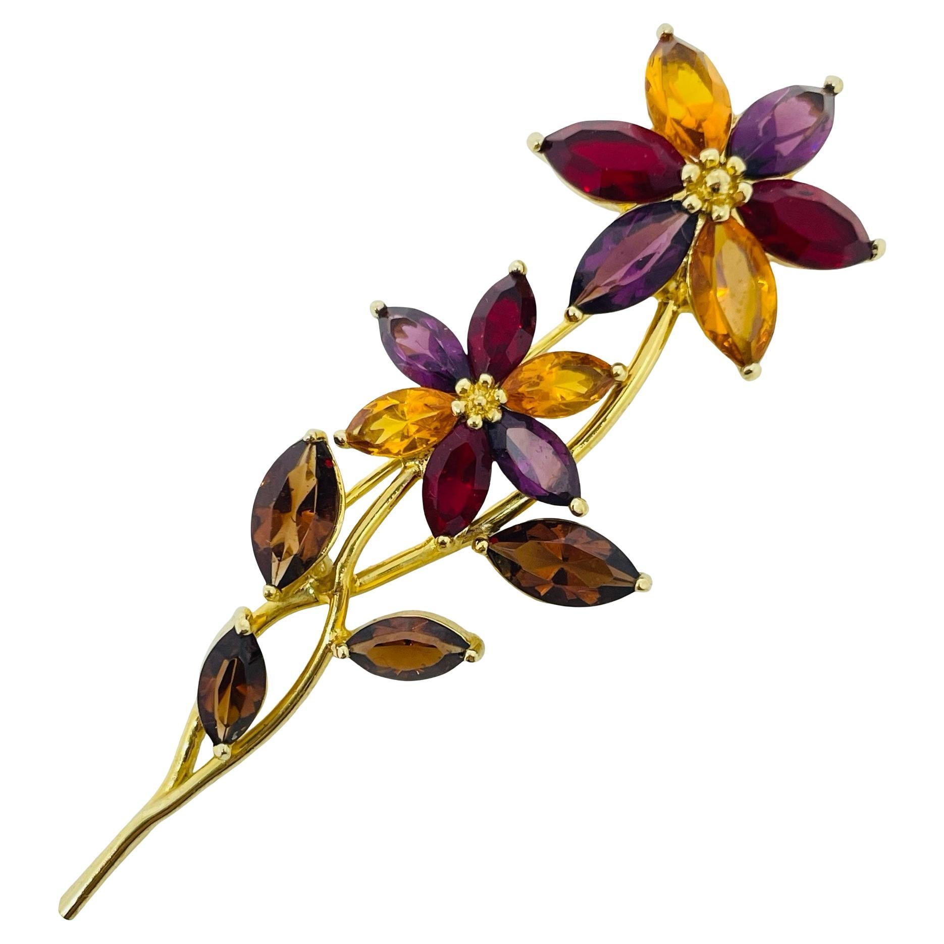 How do you identify vintage brooches?