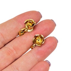 MONET signed vintage gold tone small flower designer clip on earrings