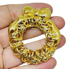 MONET broche de diseño con corona de flores en tono dorado vintage firmado