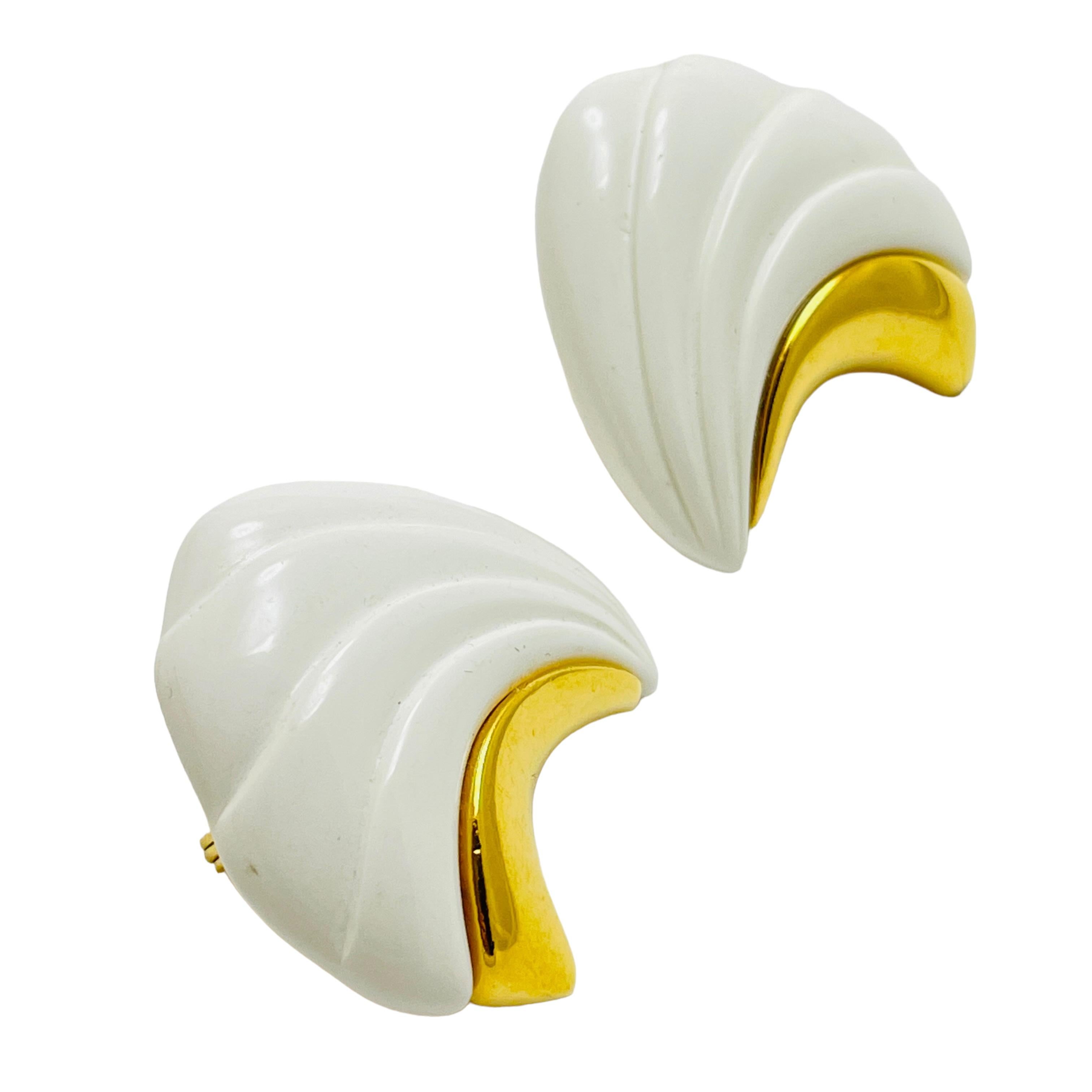 Women's MONET signed vintage gold white lucite designer clip on earrings For Sale