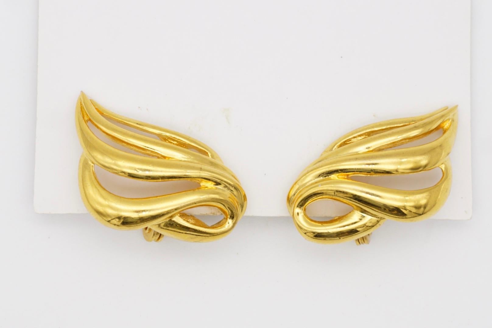 Women's or Men's Monet Vintage 1970s Classic Openwork Wing Fire Leaf Elegant Gold Clip Earrings