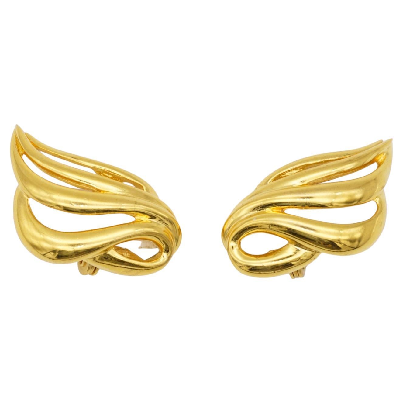 Monet Vintage 1970s Classic Openwork Wing Fire Leaf Elegant Gold Clip Earrings For Sale