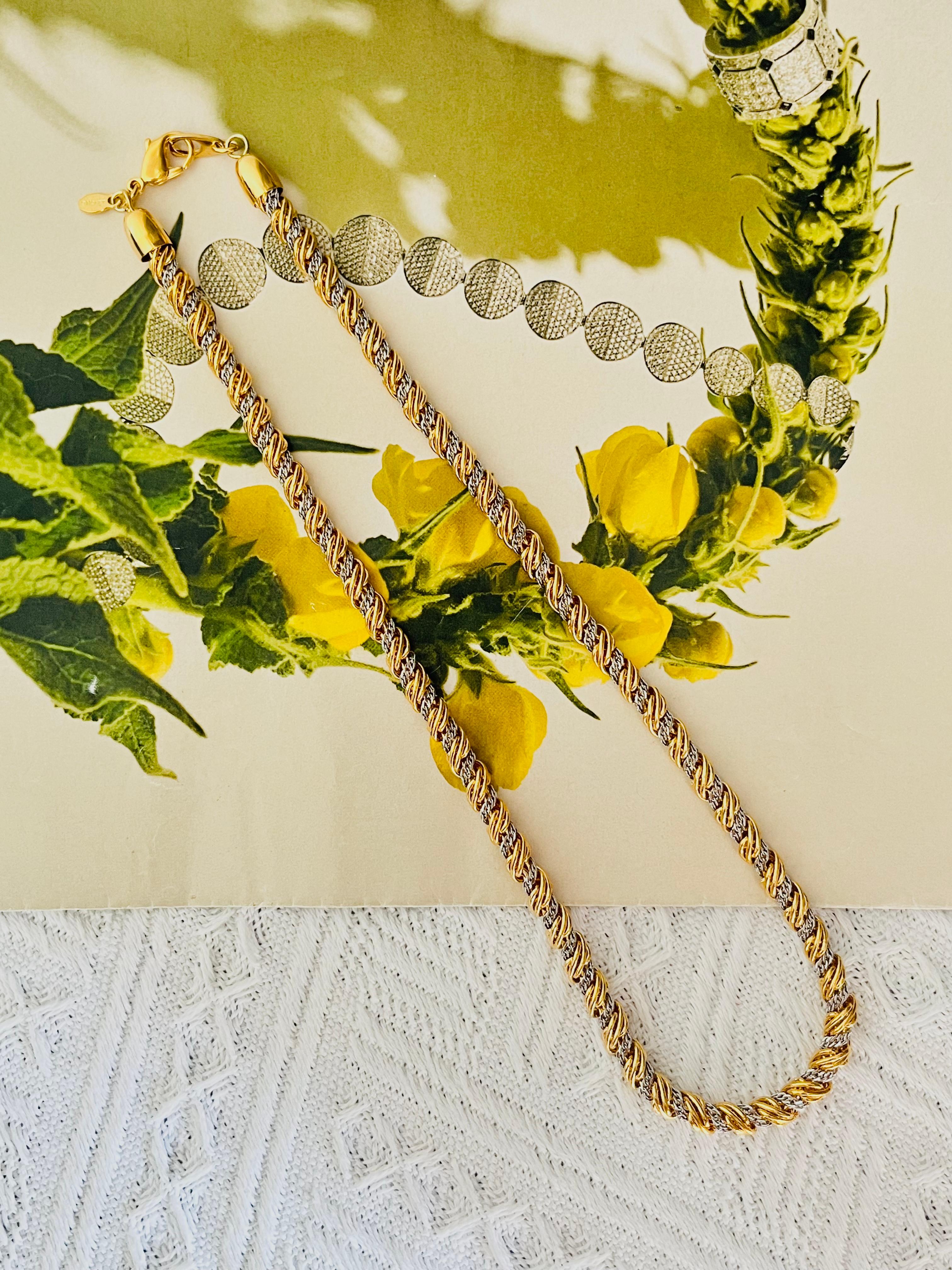 Monet Vintage 1980 Unisex Spiral Twist Interlinked Rope Chain Collana modernista, A. Silver Gold Tone

Può essere indossato anche come bracciale o aggiungere un ciondolo. 

Condizioni eccellenti. Molto nuovo. 100% autentico. Firmato