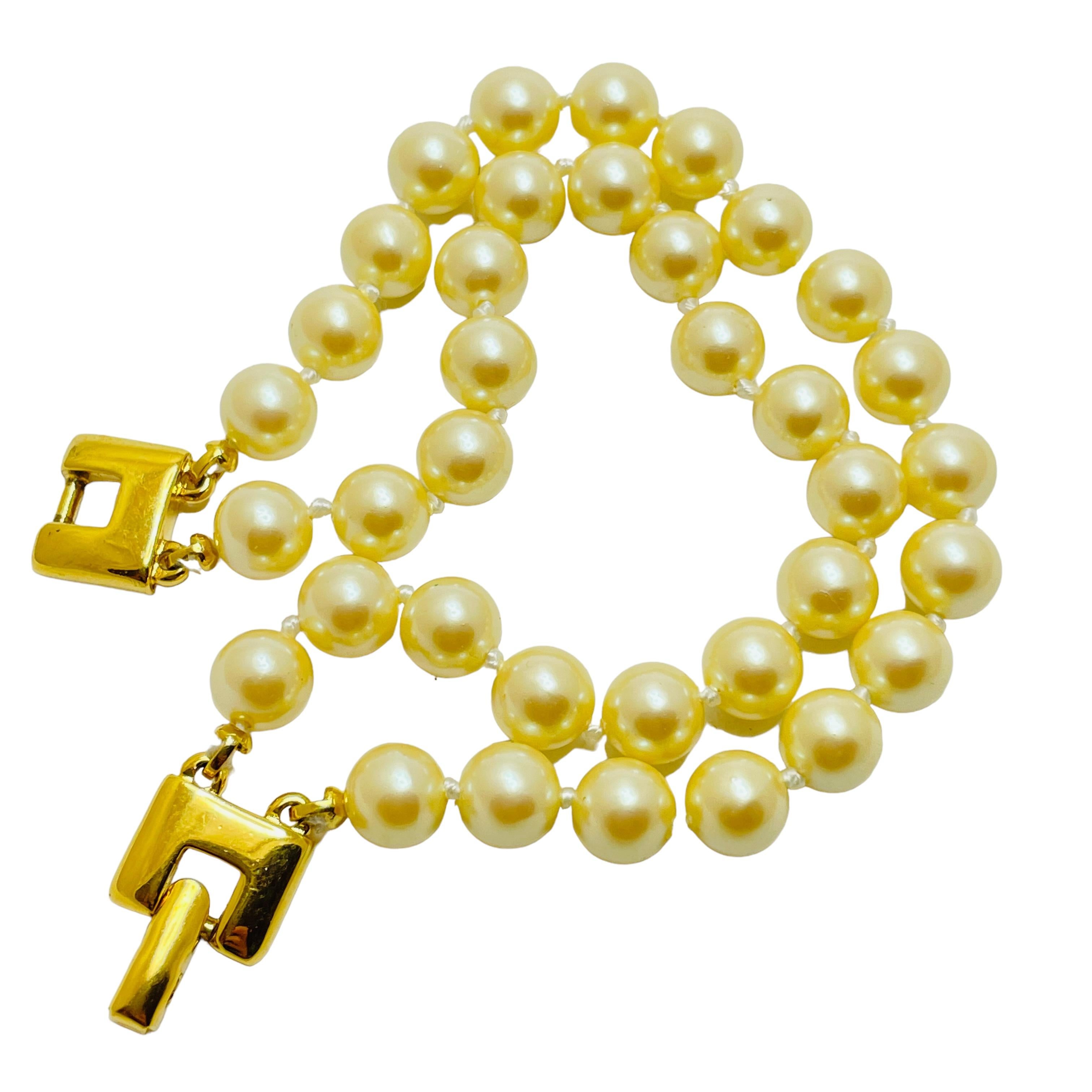 Women's or Men's MONET vintage gold faux pearl double row designer bracelet For Sale