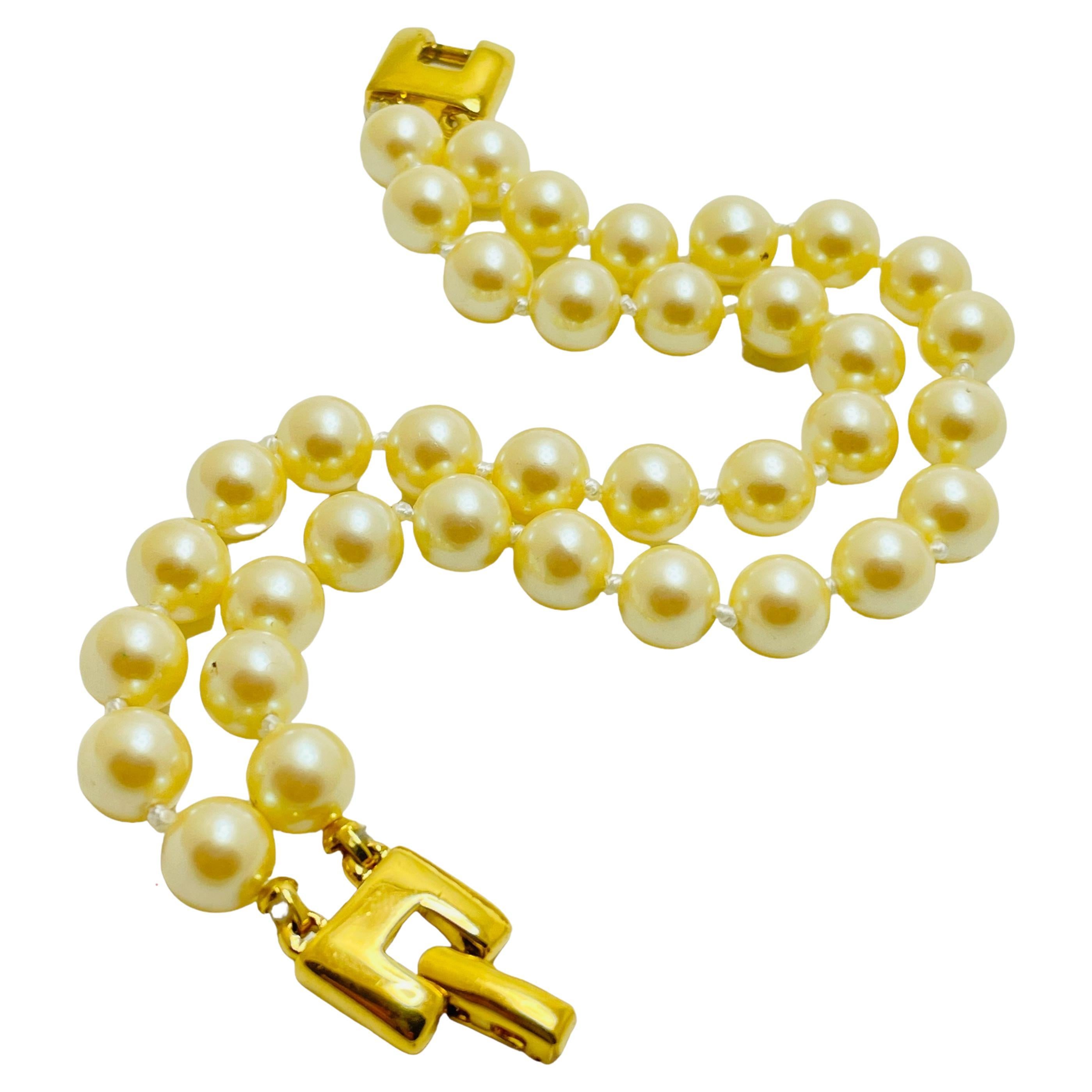 MONET vintage gold faux pearl double row designer bracelet For Sale