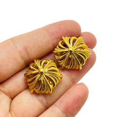 MONET vintage gold tone designer clip on earrings