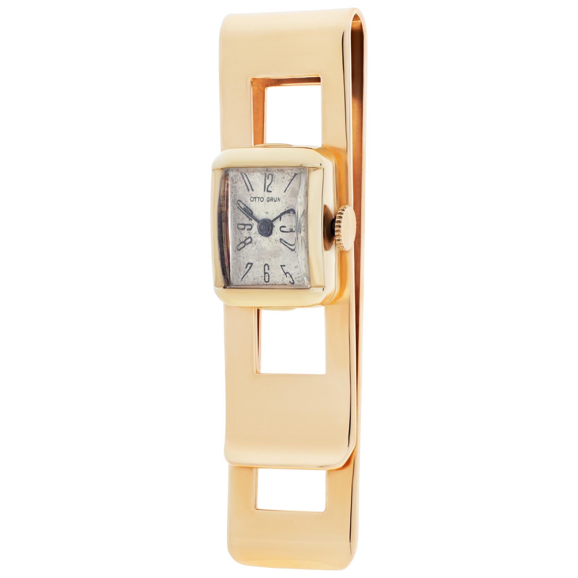 Money Clip in 14k yellow gold with Otto Grun watch. Measures 2.45'' x 0.6''.
