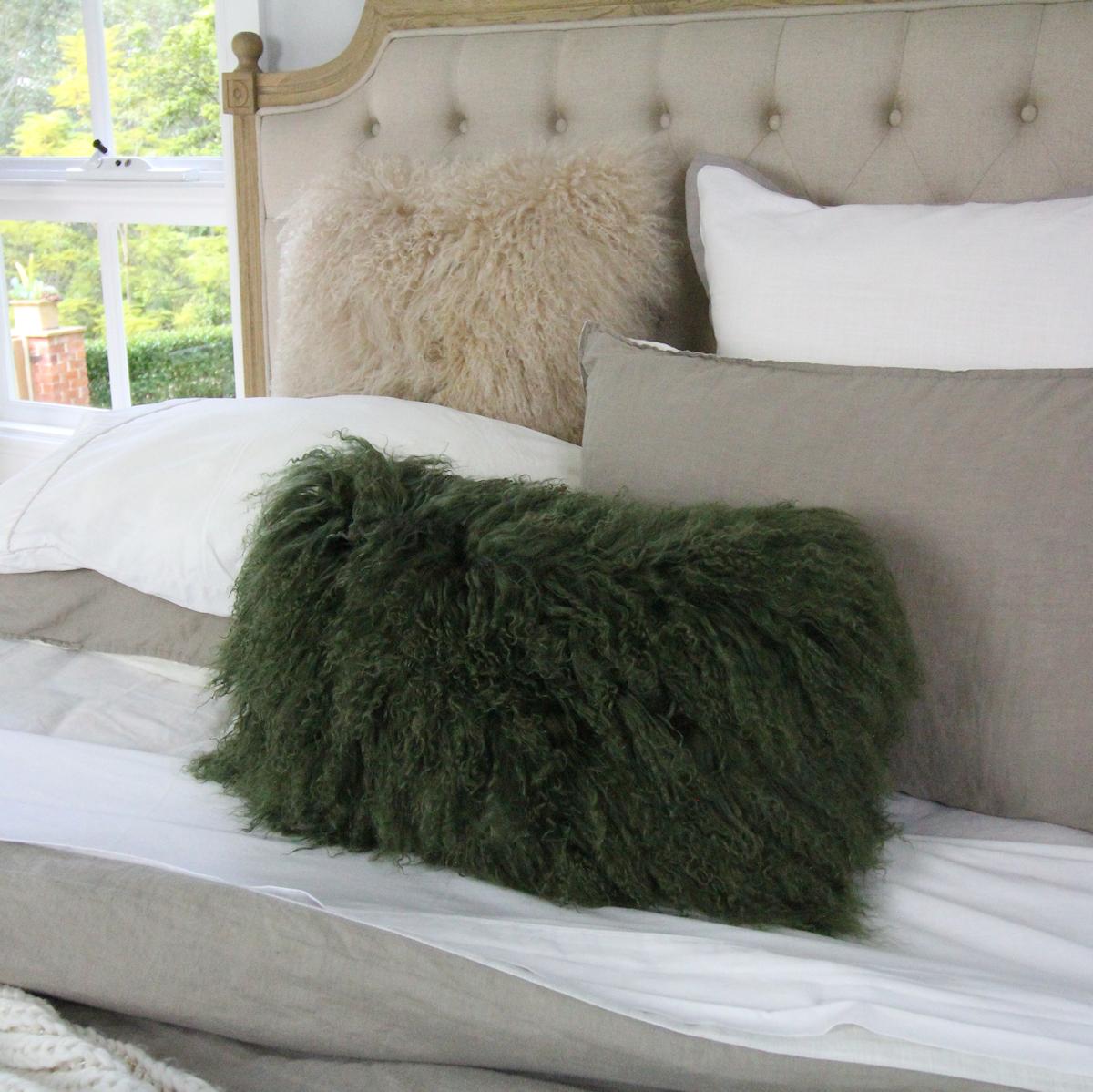 Create an atmosphere of stylish comfort layering a sofa or bed with this alluring, Mongolian Fur lumbar pillow. Handcrafted from the finest Mongolian Sheepskin boasting with supreme fur like qualities making it feel and look like real fluffy fur.
