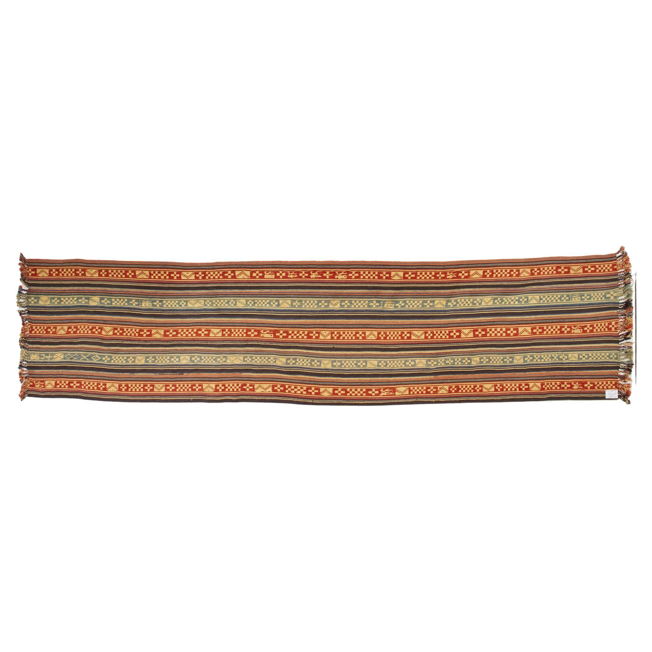 Very interesting this vintage Mongolian kilim: It's made up of stripes in pastel colors joined togheter.
The dense geometric pattern is arranged along the lenght of the kilim.