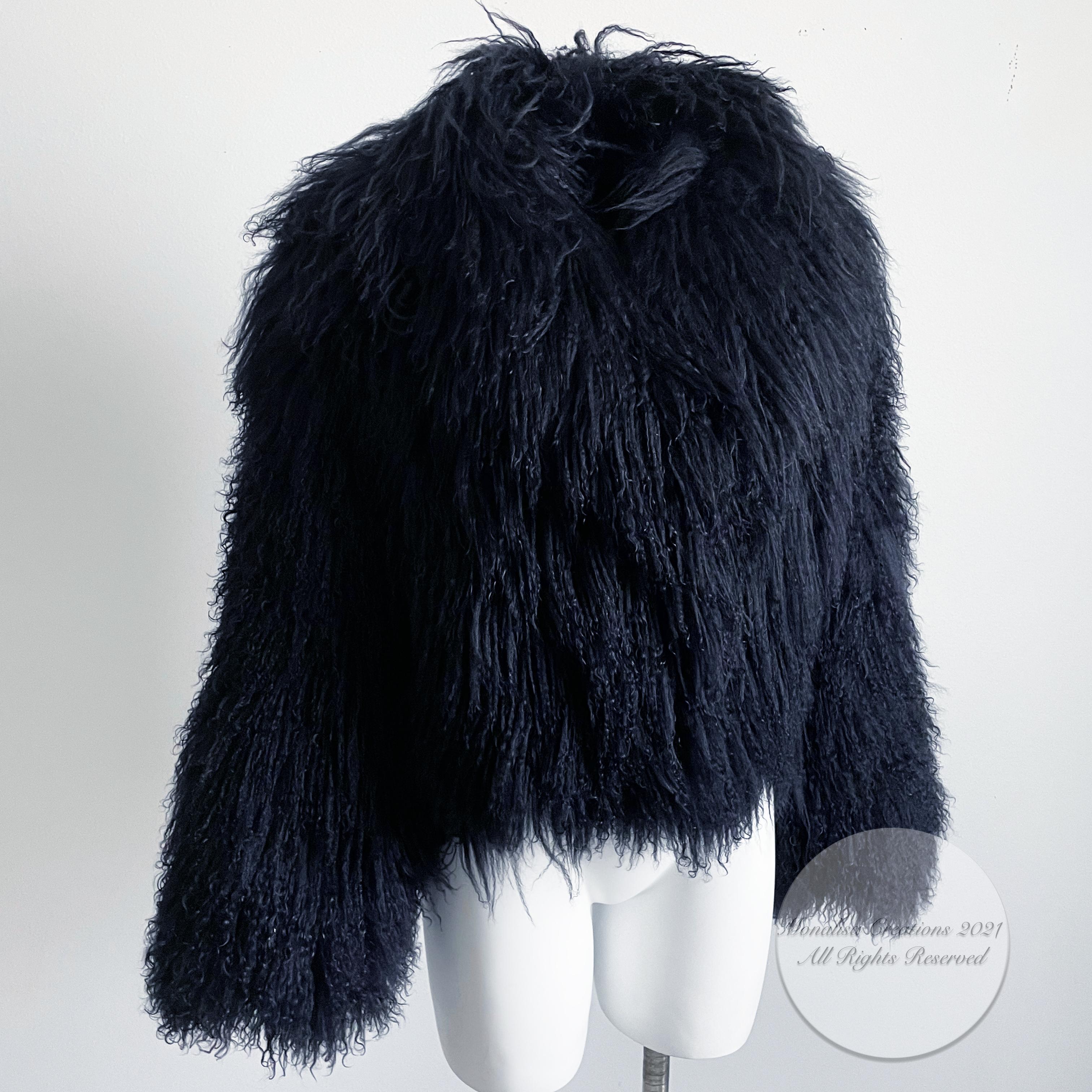 Authentic, preowned, vintage 90s Mongolian lamb fur jacket by Louis Feraud for Saks Fifth Avenue.  Black curly lamb fur, lined in satin with hook/eye closures.  No size tag but fits like a modern S/M, based on these measurements (appx): shoulders -