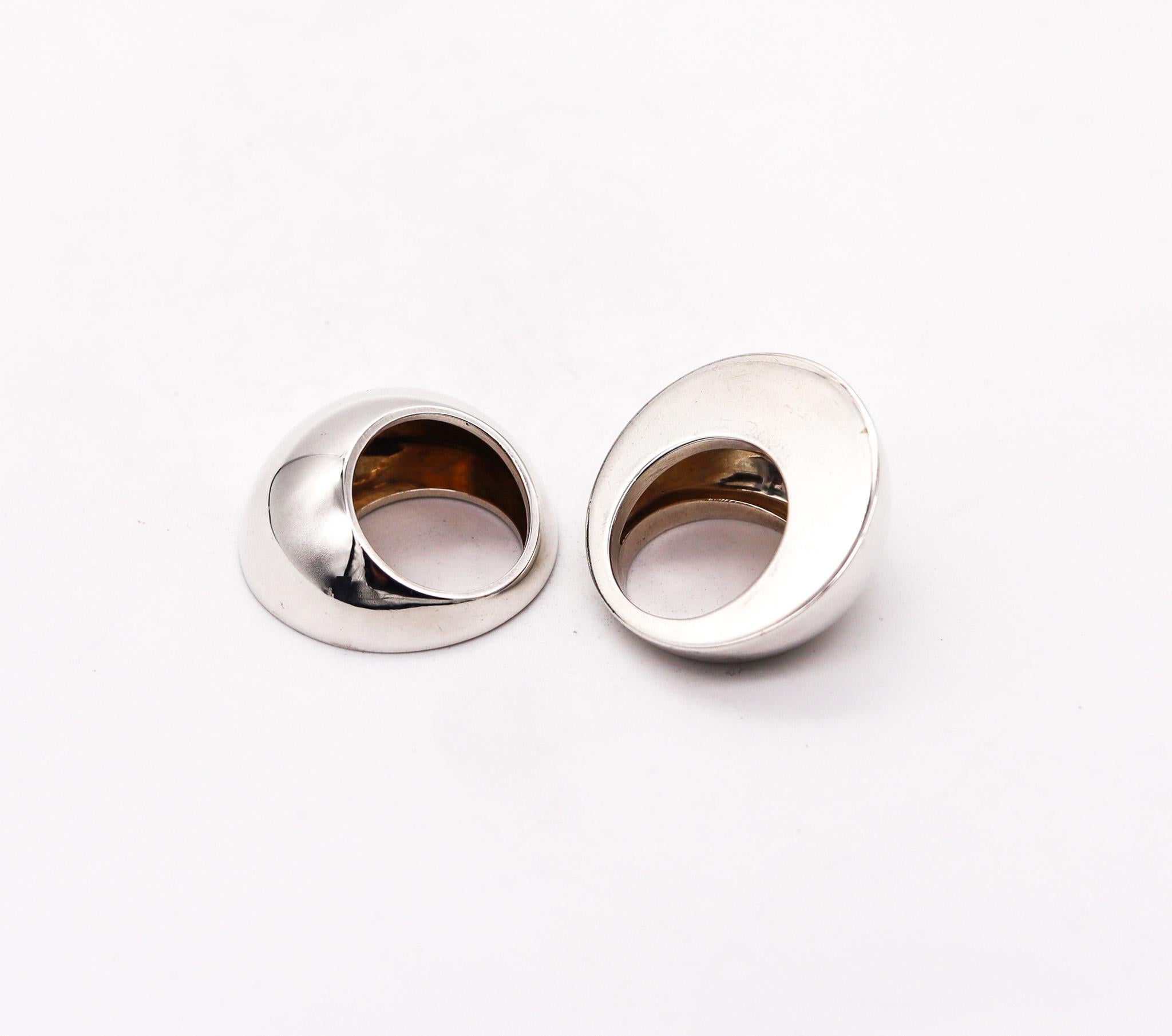 Pair of geometric stackable rings designed by Monica Coscioni. 

Beautiful and sleek contemporary pair of ultra modern rings, created in the city of Orvieto Italy at the jewelry atelier of the designer Monica Coscioni. This modern geometric pair of