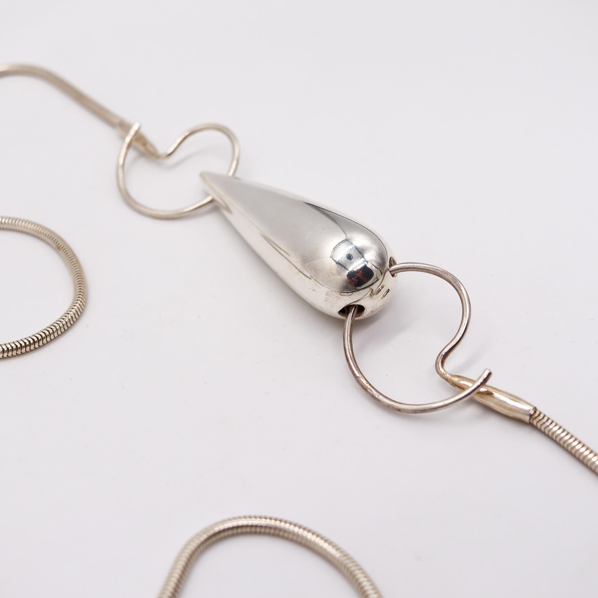 Drop necklace sautoir designed by Monica Coscioni. 

Beautiful contemporary drop necklace, created in the city of Orvieto Italy at the jewelry atelier of the designer Monica Coscioni. This modernist piece has been crafted in solid .925/.999 sterling