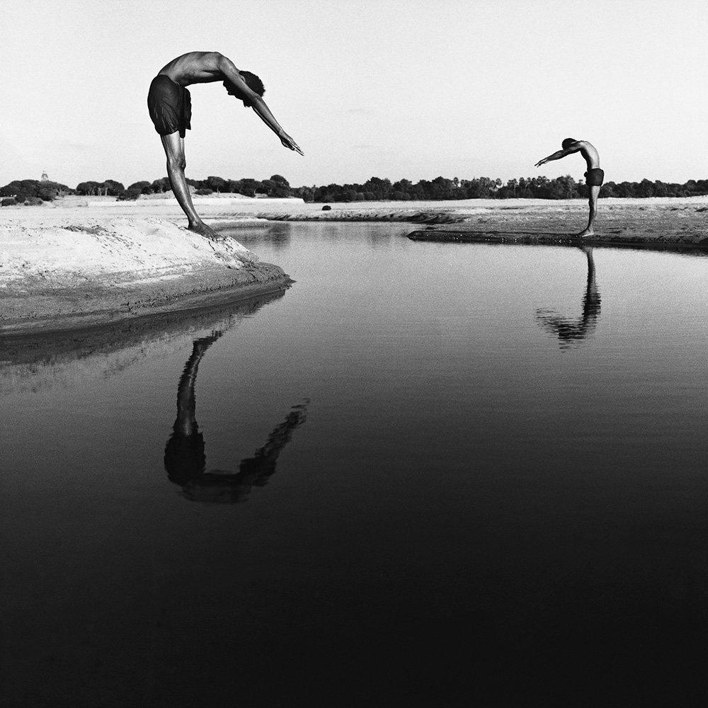 Divers by Monica Denevan  - Photography, Silver Gelatin Print, Burma 2014

Monica Denevan studied photography at San Francisco State University.  She has travelled extensively in Burma and China for many years.  Denevan’s photographs have been