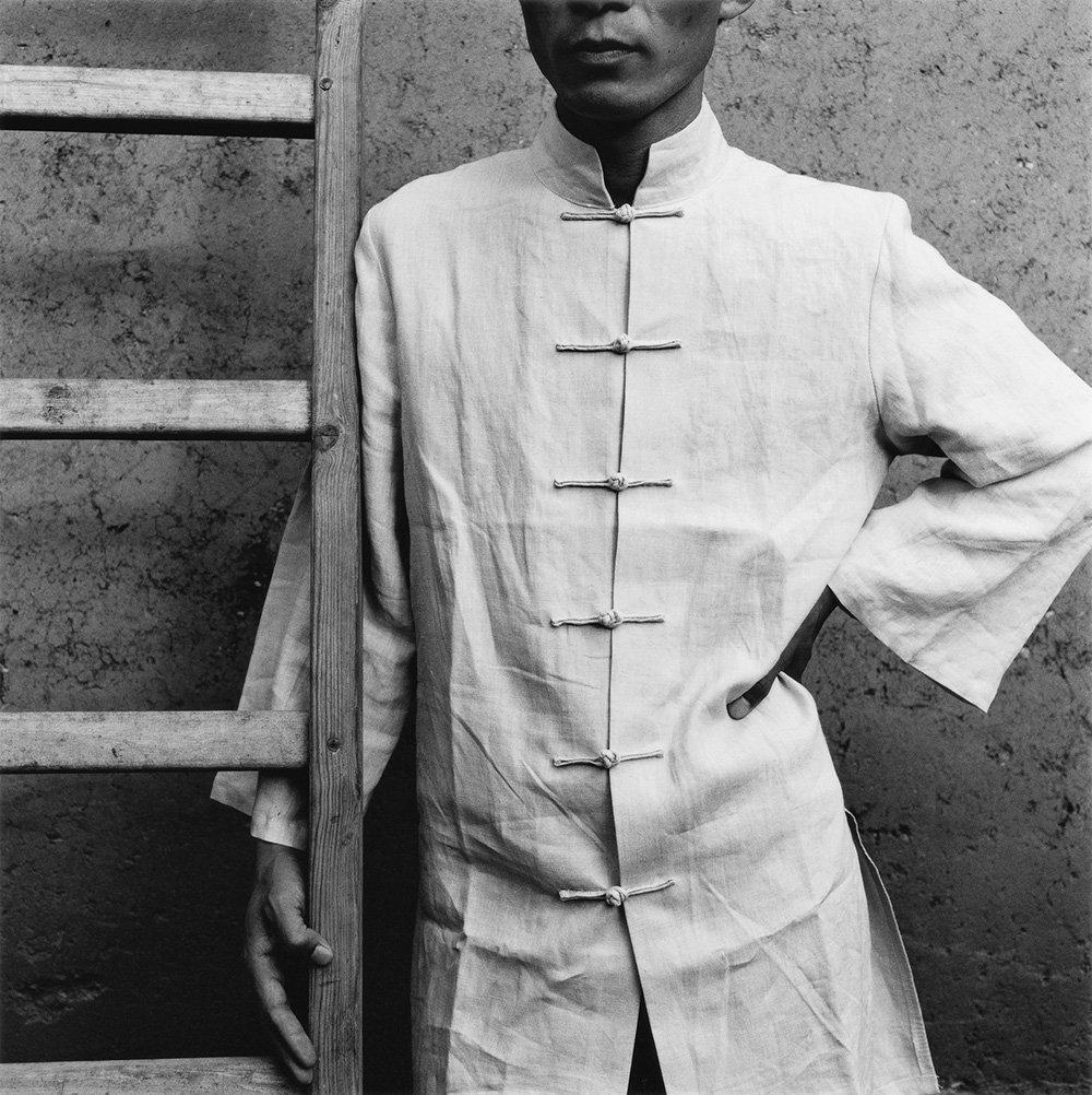 Long White Shirt by Monica Denevan  - Photography, Silver Gelatin Print, 2008

Monica Denevan studied photography at San Francisco State University.  She has travelled extensively in Burma and China for many years.  Denevan’s photographs have been