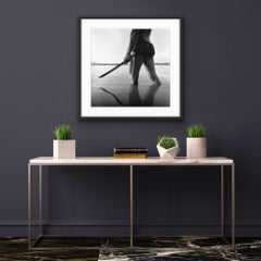 Vigilant by Monica Denevan. Photograph - Burma. Lower body with tattoo and sword