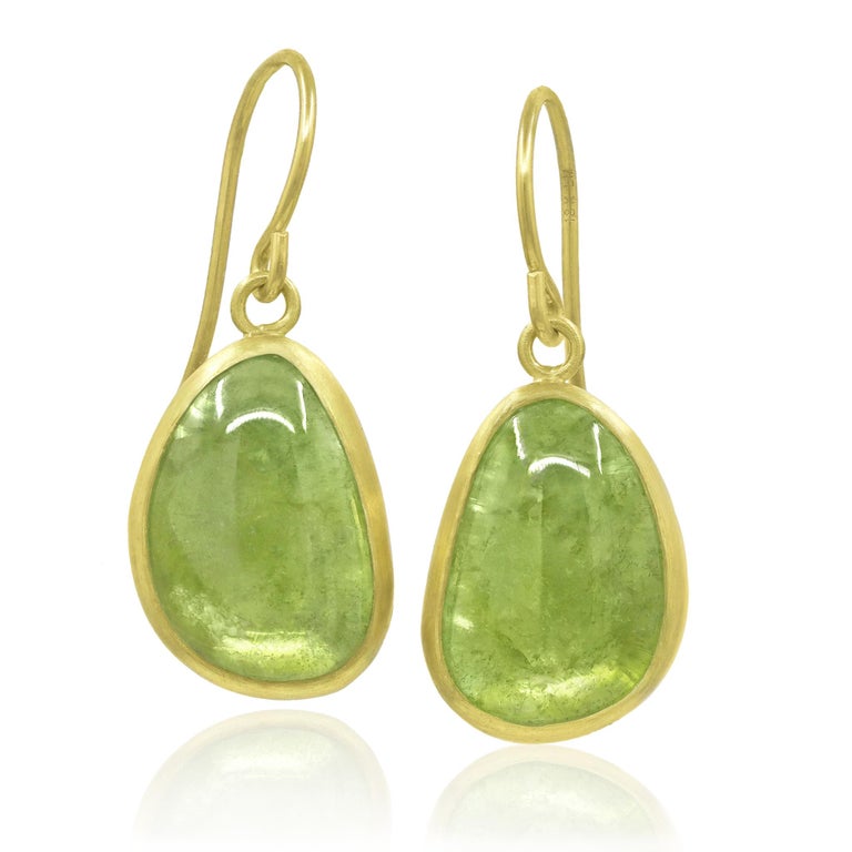 One of a Kind Drop Earrings handcrafted by jewelry maker Monica Marcella in matte-finished 18k yellow gold showcasing a gorgeous pair of matched apple green tourmaline that seemingly glow from within. Like candy for your ears! 18k stamp on each