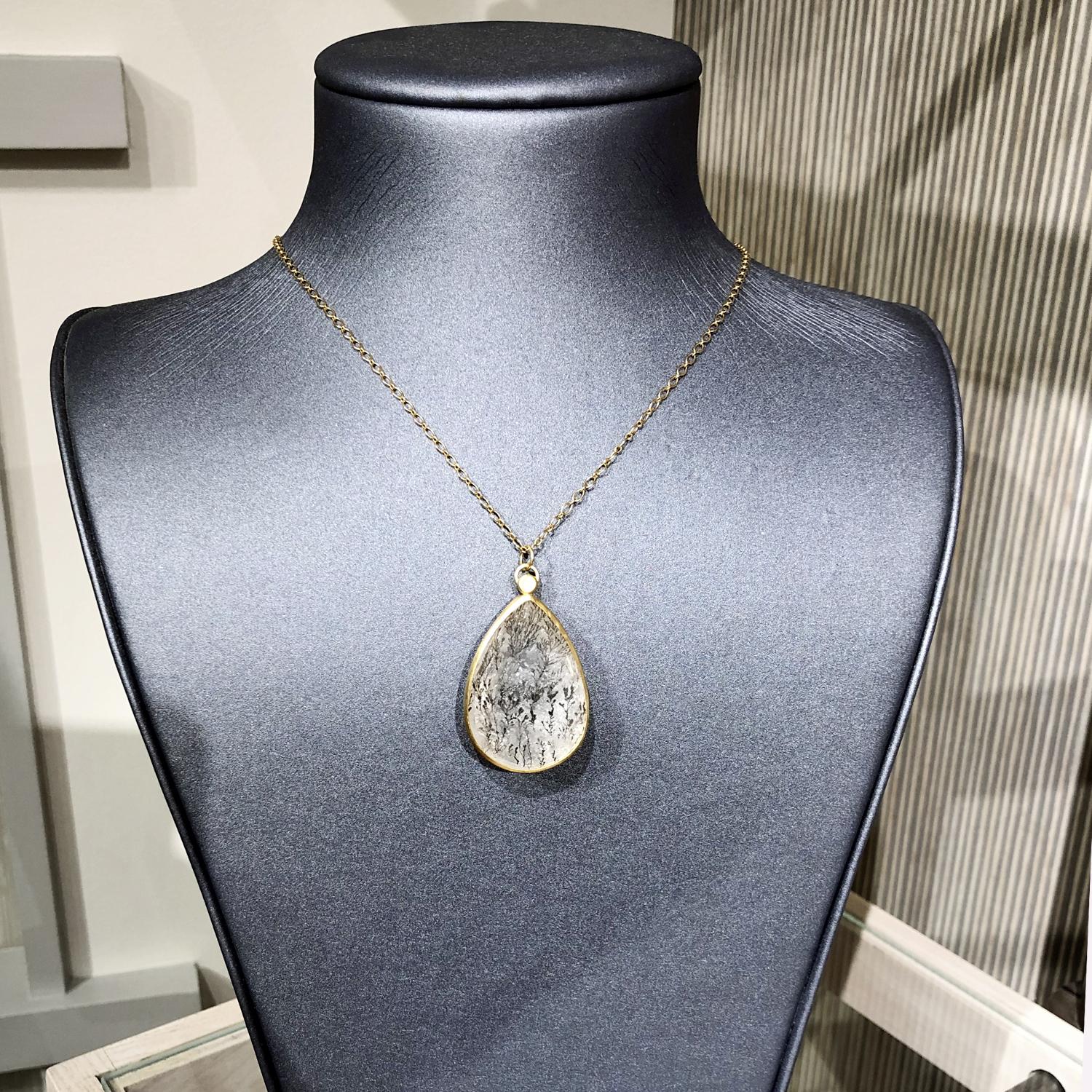 One of a Kind Drop Necklace handcrafted in matte-finished 18k yellow gold by jewelry designer Monica Marcella showcasing a stunning pear-shaped dendritic quartz uniquely faceted on both the front and back to wear two ways,  and attached to an 18