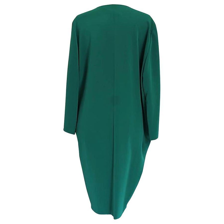 Triacetate 88%) and polyester Emerald green color Two pockets Total length cm 101 (39.7 inches) Shoulders cm 44 (17.33 inches)
