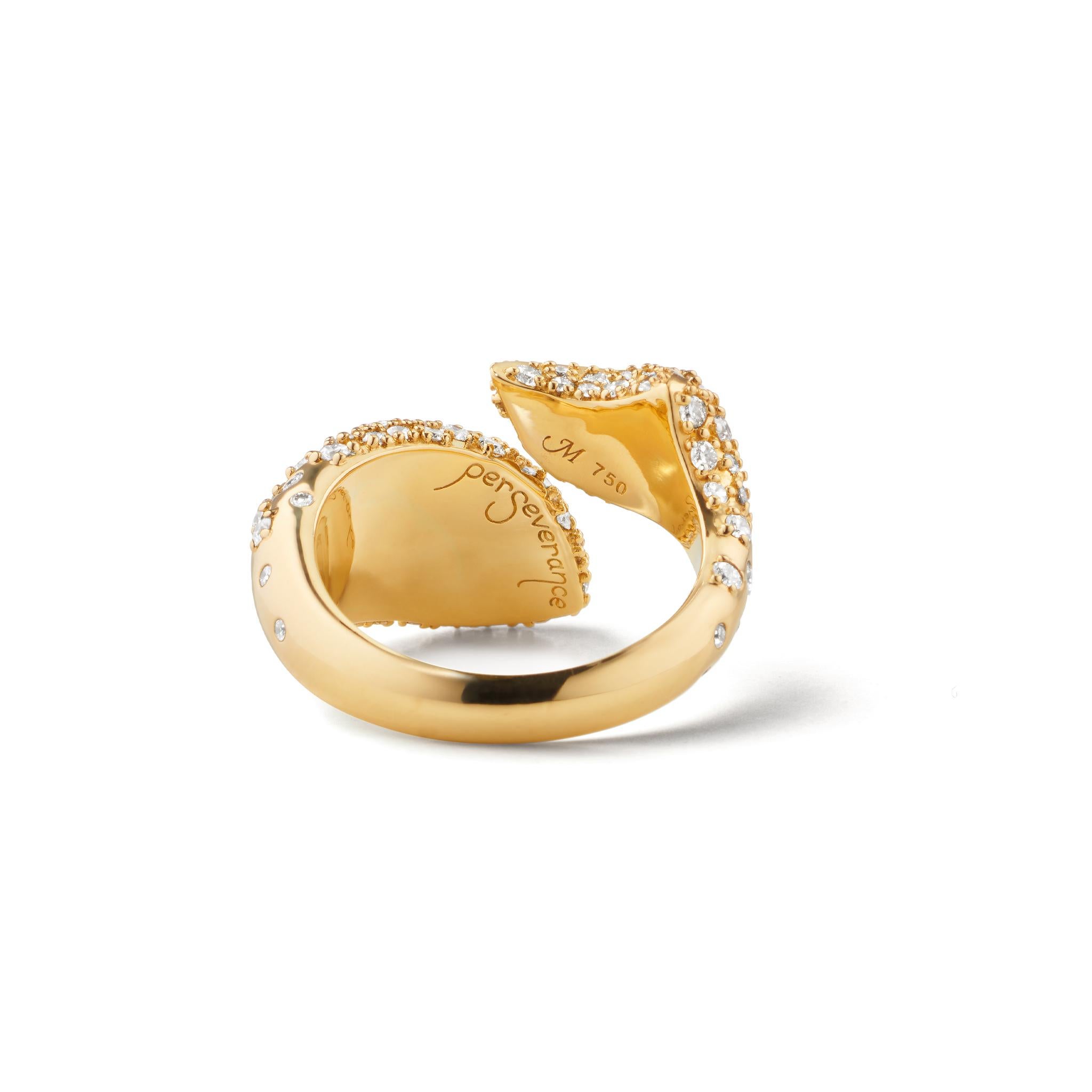 Why perseverance? Because fish only swim forward. After all, what's the point in looking back. This 18K gold abstract fish ring by Monica Rich Kosann is engraved with 