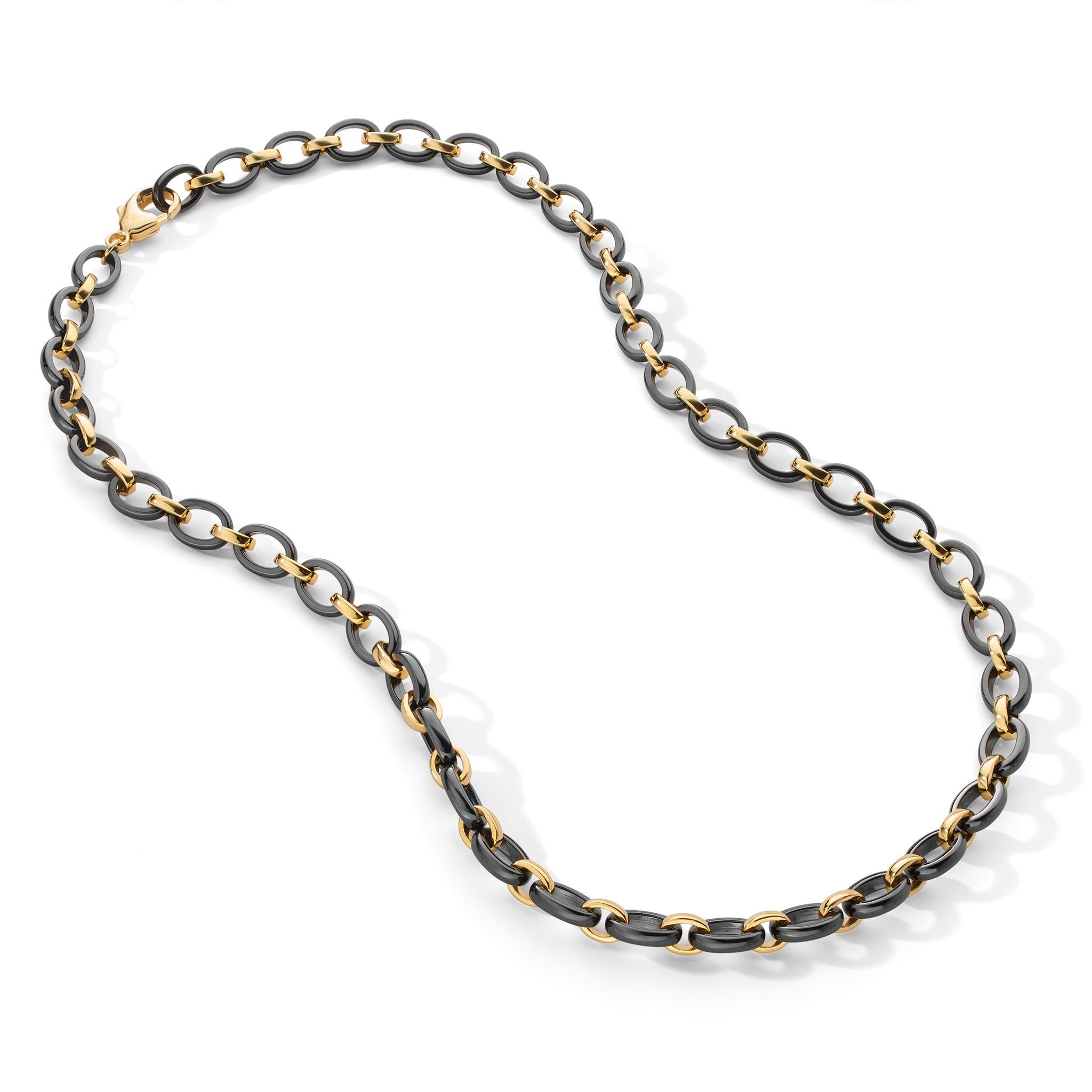 This Monica Rich Kosann alternating link necklace represents the fusion of a 21st century material with the inspirations of a 20th century art deco movement. A perfect statement piece!